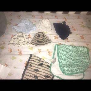 Different size hats and burp cloths